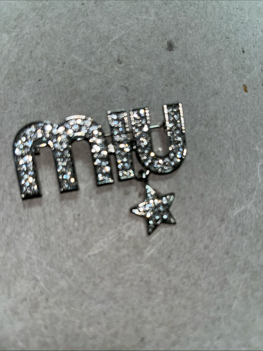 Miu Miu Silver Crystal 'MIU' Cuff Link with Star Charm